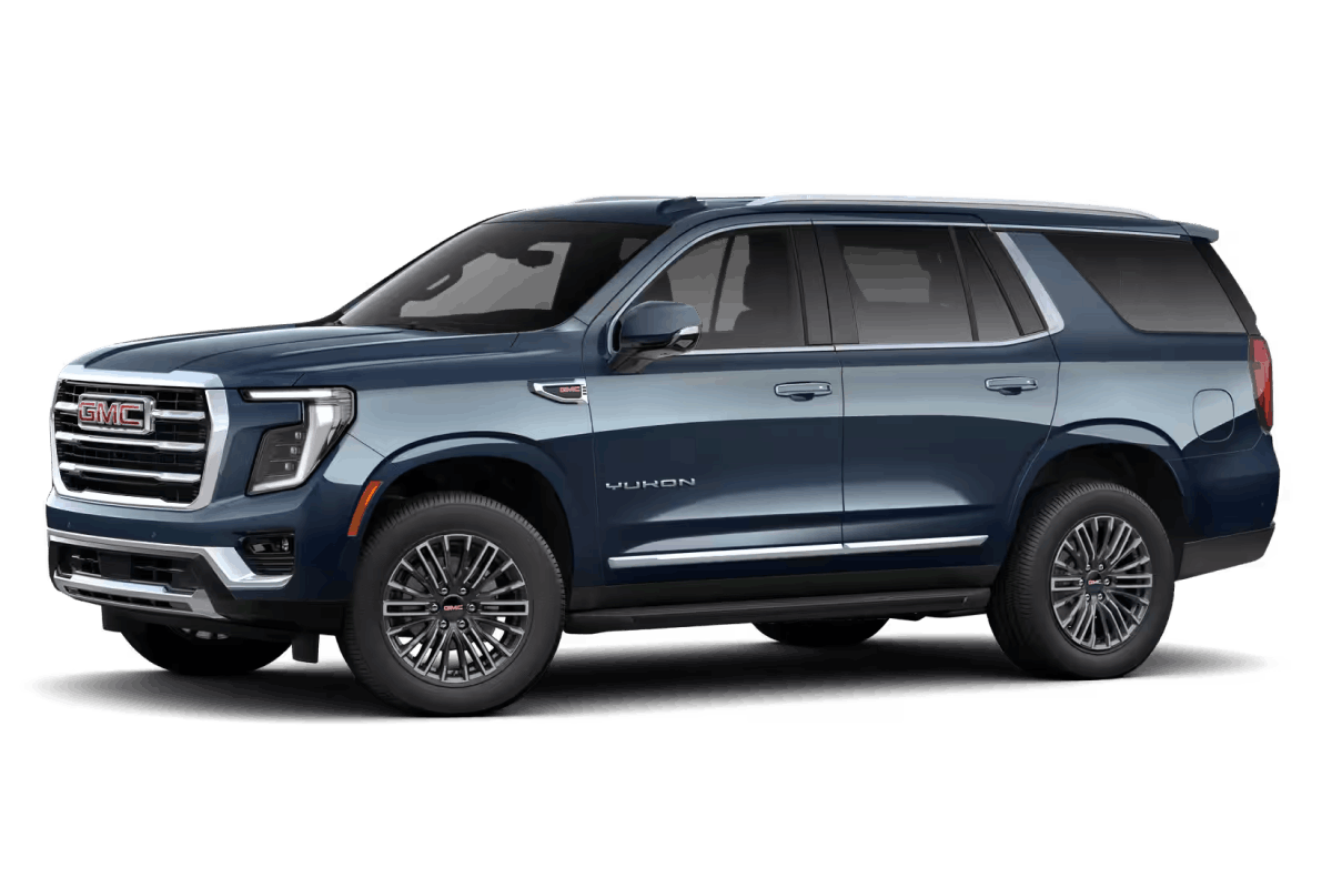 Dark blue GMC Yukon SUV shown from a front three-quarter view.