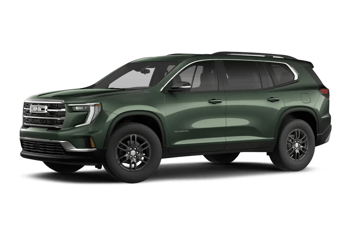Dark green GMC Acadia SUV, front three-quarter view.