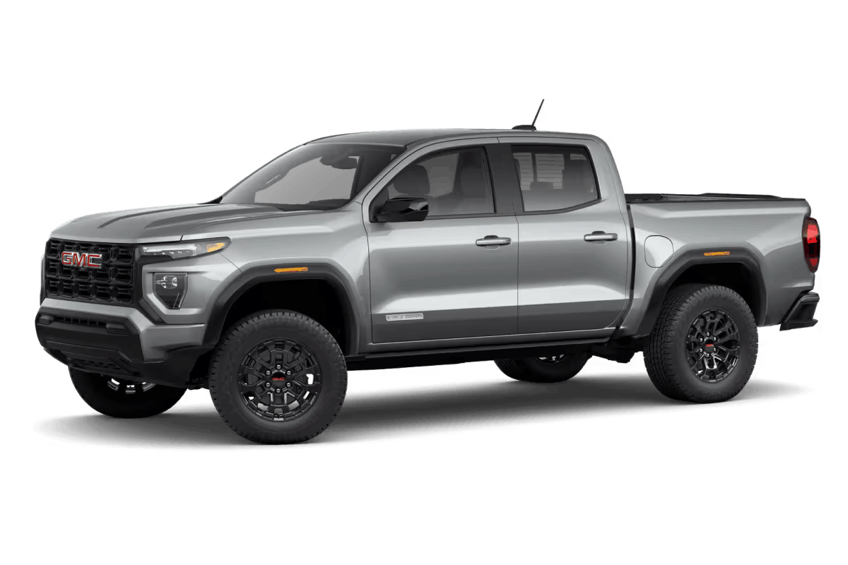 Silver GMC Canyon pickup truck, front three-quarter view.